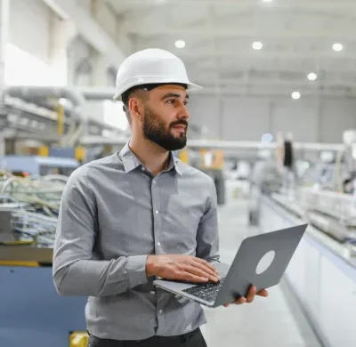 industrial-engineer-working-on-laptop-in-modern